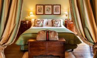 Traditionally styled bedroom at the 5-star luxury Hotel Hermitage in Cervinia, Italy - Snow-wise - Best ski hotels in the Alps for traditional luxury