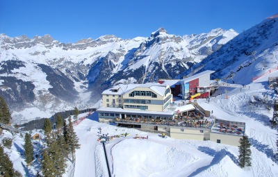 View of Trübsee Alpine Lodge ***, Engelberg, Switzerland, with panoramic snowy mountain scenery