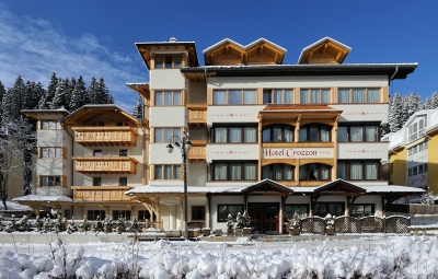 View of front of the Hotel Crozzon ***, Madonna di Campiglio, Italy, wth snow on the ground