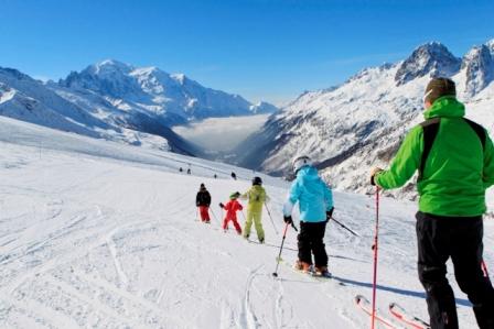 Family skiing on the slopes above the Chamonix valley - Snow-Wise - Tailor-made luxury family ski holidays at Easter 2024