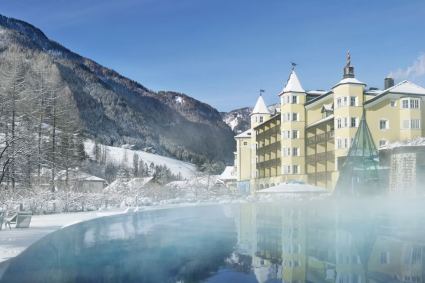 Exterior of the luxury family-friendly 5-star Adler Spa Resort Dolomiti in Ortisei, Italy in winter - Snow-wise - Best ski hotels for families