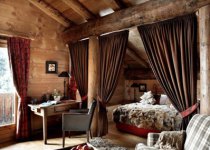 Luxurious and cozy bedroom in Les Fermes de Marie, Megeve, France - Snow-wise - Best ski hotels for alpine charm
