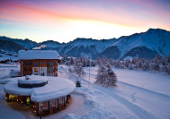 Exterior of the luxury 4-star Hotel Royal in Riederalp, Aletsch Arena, Switzerland, shown by Snow-Wise, with ski-in/ski-out access and panoramic views.