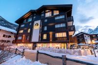 Exterior of the luxury 4-star superior Le Mirabeau Resort & Spa hotel with its Matterhorn views, central location,  gourmet dining and excellent spa facilities