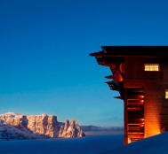 Exterior of the luxury 5-star Adler Lodge Alpe in the Alpe di Siusi (Seiser Alm), Italy, with ski-in ski-out access to snow-sure slopes and panoramic Dolomite views