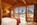 Bedroom in the luxury 5-star ski lodge Adler Lodge in Alpe di Siusi (Seiser Alm), Italy, with panoramic Dolomite views, spa facilities, and ski-in/ski-out access