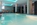 Swimming pool of the luxury 5-star Grand Hotel des Alpes in Chamonix, France, with its central location and mountain views