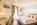 Bedroom of the luxury 5-star Grand Hotel des Alpes in Chamonix, France, with its central location, spa and swimming pool, and mountain views