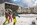 Skiers outside the snow-covered modern 3-star Hotel Pointe Isabelle in Chamonix, France, with its central location, trendy bar and apres-ski terrace