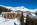 Mountain views and exterior of the 3-star Hotel Waldhaus, eco-friendly ski hotel in Bettmeralp, Aletsch Arena, Switzerland, with ski-in/ski-out access