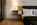 Bedroom in the luxury 5-star hotel The Omnia in Zermatt, Switzerland with its Matterhorn views, contemporary mountain lodge style, gourmet dining and state-of-the-art spa