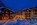 Night-time view of the exterior of the luxury 4-star Schlosshotel Zermatt in Zermatt, Switzerland with its spa and swimming pool, Matterhorn views and location close to ski lifts