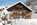 Exterior of the luxury 4-star family-run Hotel Evaldo in Arabba, Italy, with its stunning Dolomite views, swimming pool, spa and convenient location close to the ski lifts