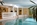 Swimming pool of the luxury 4-star family-run Hotel Evaldo in Arabba, Italy, with its stunning Dolomite views, swimming pool, spa and convenient location close to the ski lifts
