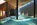 Indoor swimming pool in the 5-star luxury Tschuggen Grand Hotel in Arosa, Switzerland, with its private lift access to snow-sure slopes, gourmet dining, state-of-the-art spa and swimming pool, and kids club.