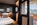 Bedroom with balcony in the luxury 4-star Hotel MiL8 in Avoriaz, France's snowiest ski resort, with its perfect ski-in/ski-out location, panoramic roof-top infinity pool, spa, gourmet dining and children's play area.