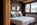 Bedroom in the luxury 4-star Hotel MiL8 in Avoriaz, France's snowiest ski resort, with its perfect ski-in/ski-out location, panoramic roof-top infinity pool, spa, gourmet dining and children's play area.