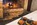 Afternoon snack by the fire in the luxury 4-star Hotel des Dromonts in Avoriaz, France's snowiest ski resort, with its ski-in/ski-out location, gourmet dining and pure altitude spa with rooftop hot tub.