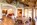 Dining and lounge area in an apartment with mezzanine in the luxury 5-star Saint Hubertus Resort & Spa in Cervinia, Italy, with its exquisite luxury apartments, fabulous spa and swimming pool, stunning Matterhorn views, and gourmet dining.