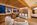 Chalet Infinity sitting area in the luxury 4-star superior Sertorelli Sport Hotel, with its mountain views, central location close to ski slopes, gourmet dining and impressive spa.