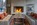Lounge with open fire in the modern urban chic, ski-in/ski-out 3-star hotel Le Totem (formerly known as the “Terminal Neige”) in Flaine, France, with fabulous spa and family-friendly buffet-style dining.