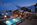 Outdoor swimming pool with panoramic mountain views at Hotel Village Montana, Tignes