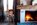 Prestige Suite living area with open fire in La Cordee des Alpes hotel, Verbier